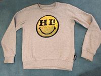 Warmer, grauer Smiley Pulli / Pullover mit Pailletten Gr. 134-140 Flensburg - Mürwik Vorschau