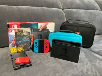 Nintendo Switch inklusive 2 spielen 2 Taschen und Zubehör Düsseldorf - Eller Vorschau