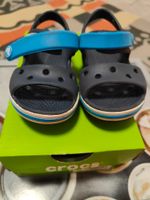 Kinderschuhgröße 6 (22 gebrauchte blaue Crocs  5 paar neue Socken Bayern - Ammerndorf Vorschau