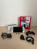 Nintendo Switch OLED + 2 ProController + Zelda BOTW + Unreval 2 München - Untergiesing-Harlaching Vorschau