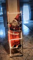 Santa Claus kletternd auf Lichtleiter Rheinland-Pfalz - Plaidt Vorschau