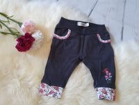 Jogginghose Joggers schwarz Blumen Schmetterlinge Gr. 50 Noppies Brandenburg - Cottbus Vorschau