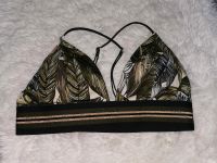 H&M Jungel Bikini Oberteil grün gold Gr 36 75B Niedersachsen - Uelzen Vorschau