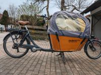 Babboe City E-Bike mit Regenverdeck, Sitzbank & Kleinkindeinsatz Bayern - Holzkirchen Vorschau