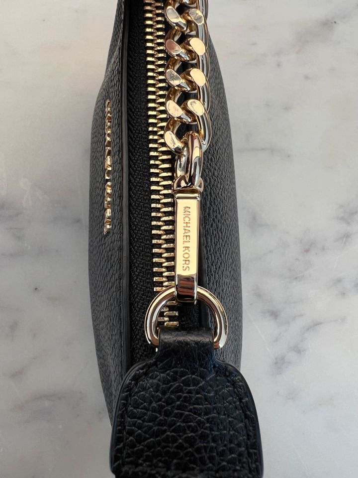 Michael Kors Tasche Pochette schwarz gold Leder in Köln