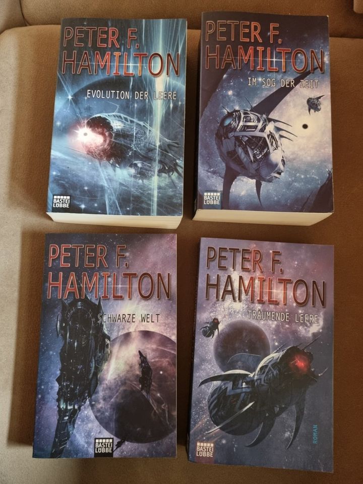 7 x Peter F. Hamilton - Salvation 1-3 und The Void 1-4 (SF) in Olpe