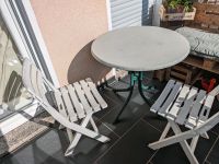 Gartentisch rund mit Metallfuß und 2 Plastikstühle Rheinland-Pfalz - Katzenelnbogen Vorschau