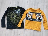 2 Langarmshirts Totenkopf und Tiger schwarz, currry Größe 110 Rheinland-Pfalz - Weisel Vorschau