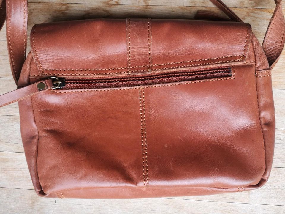 Leder-Handtasche, Saddle Bag, Quaste, cognac-braun in Köln