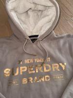 Superdry Luxe Hoodie-Kleid mit Logo in Metallic-Optik Gr 34/36 Nordrhein-Westfalen - Pulheim Vorschau