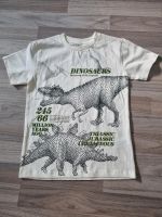 Next Shirt, Größe 122, neu, Dinosaurier, ecru Baden-Württemberg - Bietigheim Vorschau