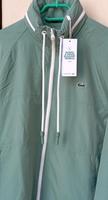 Lacoste Windbreaker mit Kapuze in Kaki/grün M ungetragen Neu Hannover - Südstadt-Bult Vorschau