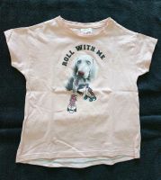 T-Shirt, rosa, Motiv: Hund mit Rollschuhen :) Gr. 104 Nordrhein-Westfalen - Hilden Vorschau