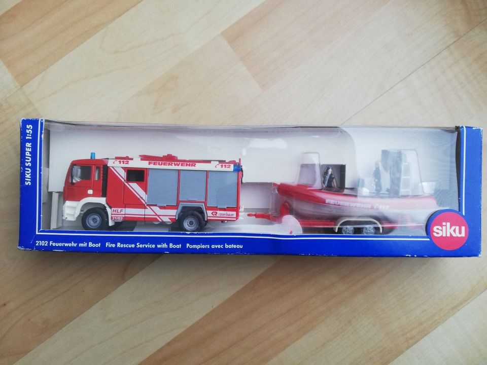 SIKU Sammlungsauflösung - Feuerwehr HLF MAN mit Boot OVP (2102) in Wuppertal