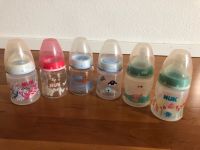 6 gedrungene Nuk Baby Milchflaschen, Glas, Kunststoff Baden-Württemberg - Ettlingen Vorschau