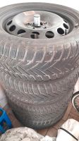 4 Winterreifen 205/55 R16 mit Radkappen von Audi Nordrhein-Westfalen - Euskirchen Vorschau