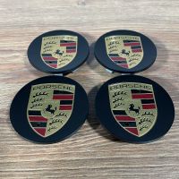 4x original Porsche Macan Nabendeckel Deckel Embleme schwarz matt Nordrhein-Westfalen - Holzwickede Vorschau