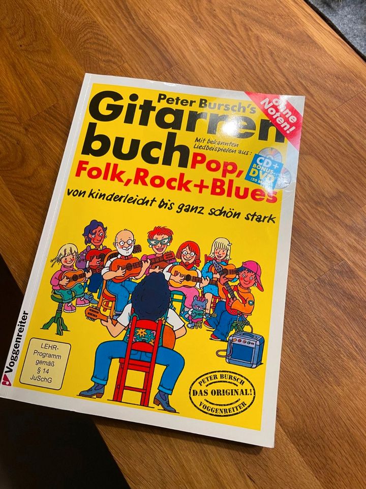 Gitarre mit Ständer + Lernbuch in Berlin