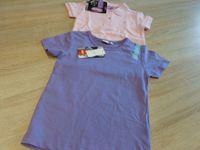 2 Shirts Poloshirt Pulli Gr. 122 - 128 lila und rosa NEU Saarland - Schiffweiler Vorschau