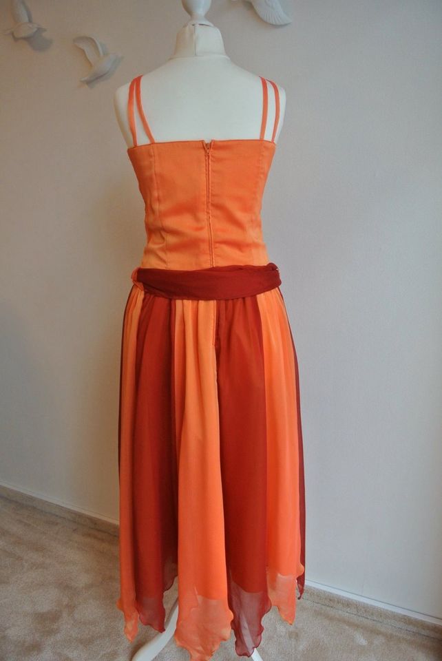 Cocktailkleid Gr. 34 orange/rot Zipfelrock sehr guter Zustand in Walsrode