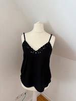 Neuwertig Orsay top Damen M 38 schwarz Spaghetti spitze Sommer Nordrhein-Westfalen - Porta Westfalica Vorschau