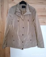 Regenjacke Jacke Tchibo TCM beige schimmernd M L neuwertig Nordrhein-Westfalen - Wilnsdorf Vorschau