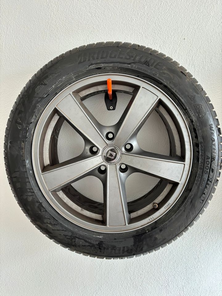 Kompletträder mit Bridgestone Ganzjahresreifen 245/50R18 in Roxheim