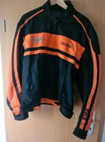 Motorrad Jacke schwarz/orange  gr. M inkl Protectoren Niedersachsen - Wiefelstede Vorschau