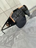 Neue, ungetragene Sonnenbrille in Schwarz mit goldenen Akzenten Nordrhein-Westfalen - Düren Vorschau