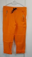 Orangene Joggpants in Größe 40 Frankfurt am Main - Sachsenhausen Vorschau