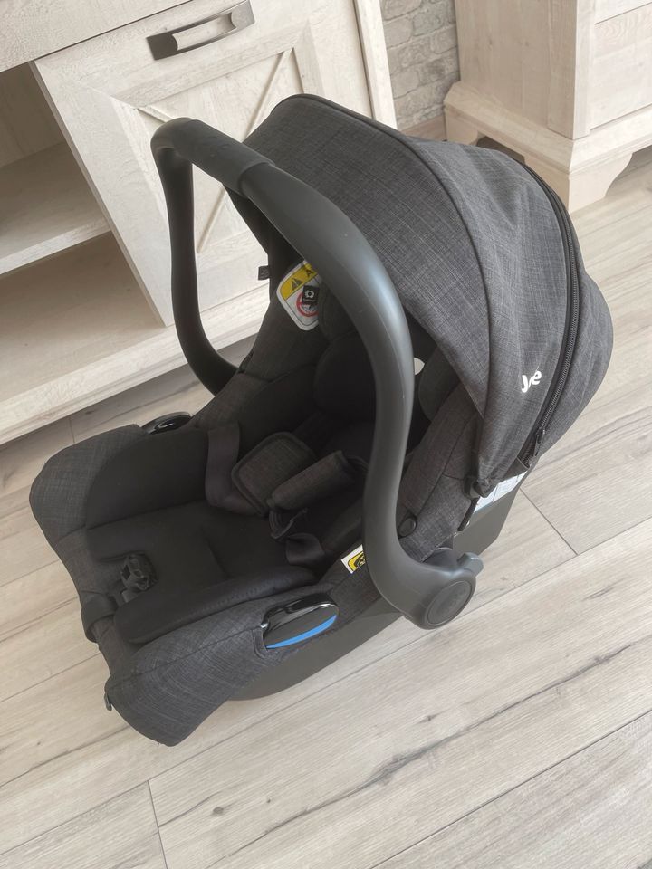 Joie Babyschale mit Newborneinsatz und Regenverdeck in Lünen