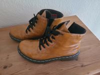 rieker Schuhe, ocker, leicht gefüttert, glänzend Boots Gr. 42 Nordrhein-Westfalen - Hilden Vorschau