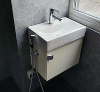 Gäste WC Badmöbel Waschtisch mit WC Handbrause + Armatur 399,-€* Niedersachsen - Bad Essen Vorschau