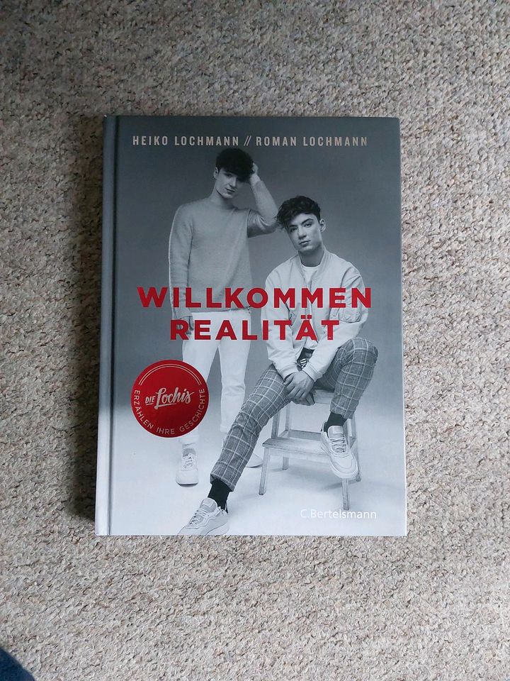 Buch "Willkommen Realität" von den Lochis in Neuhaus