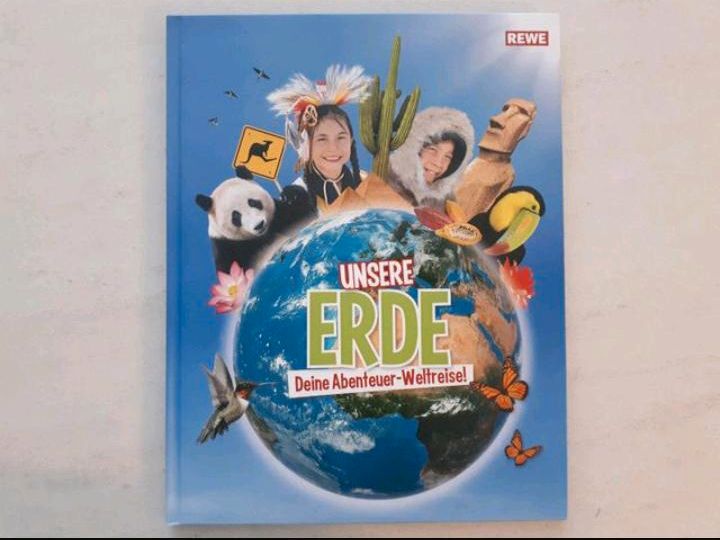 volles Stickeralbum: Unsere Erde - Deine Abenteuer-Weltreise REWE in Köln