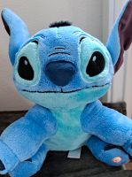 Disney Plüsch Stitch mit leuchtenden Wangen Hessen - Guxhagen Vorschau