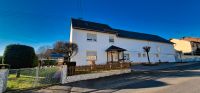 Großzügiges, massiv gebautes Einfamilienhaus mit Nebengebäude, Ga Rheinland-Pfalz - Mudenbach Vorschau