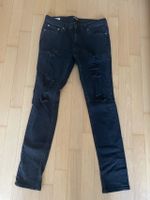 Skinny Jeans schwarz mit Rissen von Jack & Jones Größe 31/32 Düsseldorf - Hafen Vorschau