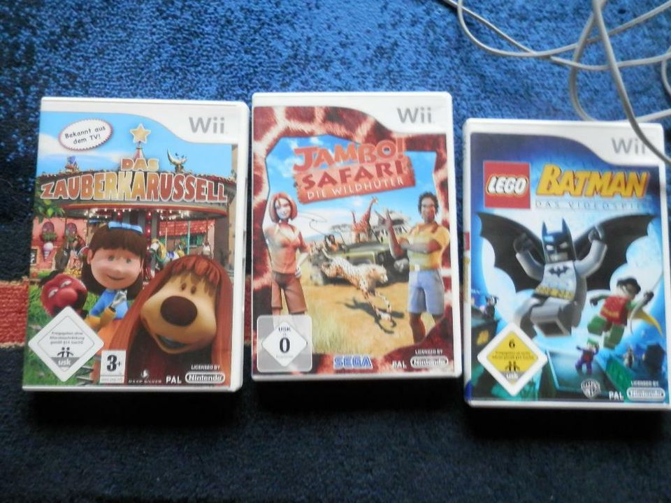 Wii Nintendo, neuwertig mit 3 Spielen in Bornhöved