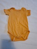 Babybody mit kurzem Arm Gr. 62/68 Apricot-Orange-Neon Nordrhein-Westfalen - Hilden Vorschau
