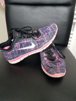 * Nike Schuhe in gr.38,5 Free Trainer Fit 4 pink lila Nordrhein-Westfalen - Mülheim (Ruhr) Vorschau