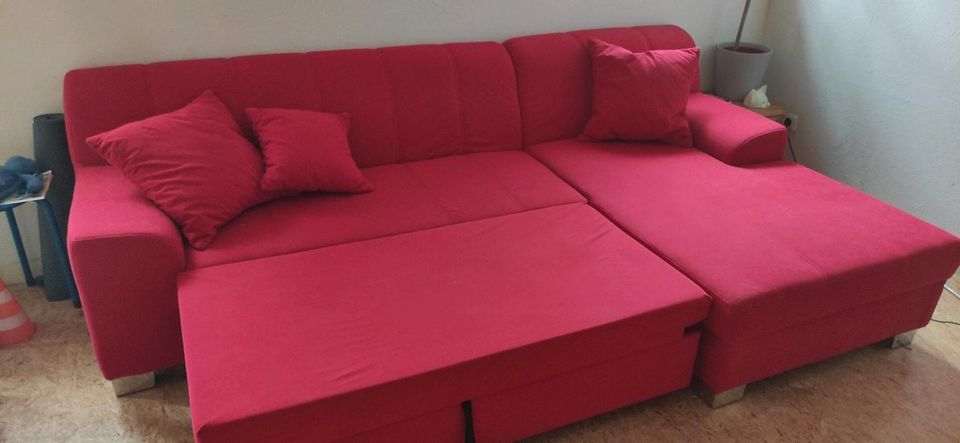 Rotes Schlafsofa zu verkaufen in Rahden