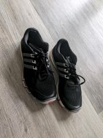 Adidas Schuhe Sneaker Turnschuhe schwarz adipure Gr. 41 Niedersachsen - Hessisch Oldendorf Vorschau