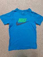 Nike T-Shirt blau Neon Schriftzug Gr. 128/134 Hessen - Laubach Vorschau