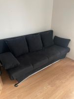 Sofa mit Schlaffunktion in schwarz mit Kissen und Stauraum Innenstadt - Poll Vorschau