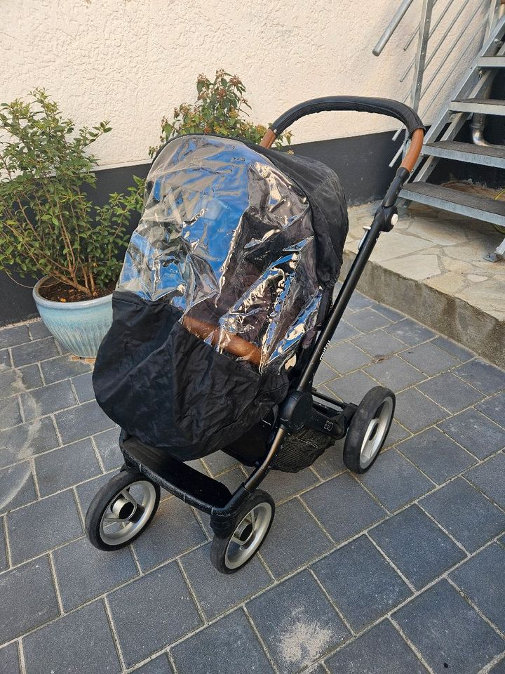 Kinderwagen/ Buggy mit Fußsack aus Schafsfell und Regenschutz in Birkenfeld