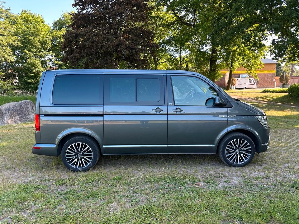 VW T6 MULTIVAN TDI DSG NAVI STDHZG LFTFG LED ACC MWST AUSWSB UVM in Prisdorf