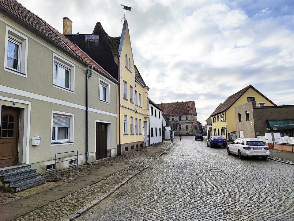 AUKTION: Mehrfamilienhaus mit Seitenflügel und Hinterhaus mit Garage in Mühlberg/Elbe