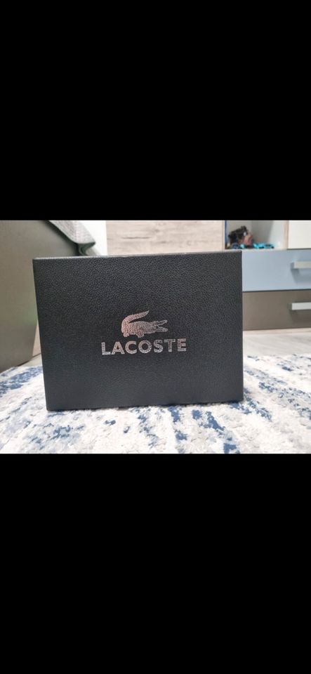 Lacoste Umhänge Tasche grau Neuwertig in Elsenfeld