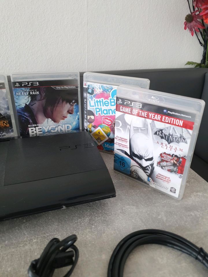 Playstation 3 Slim + 9 Spiele in Köln
